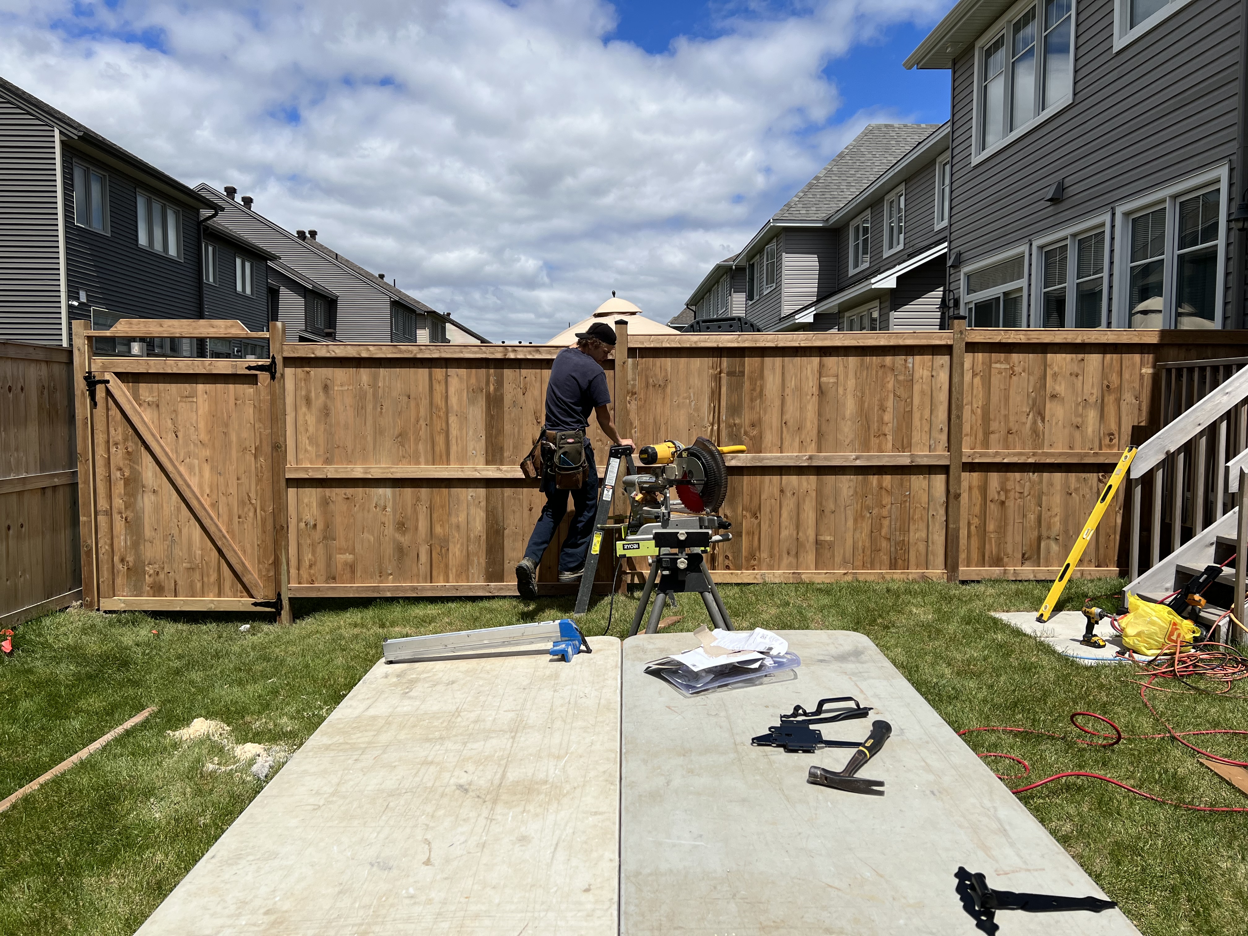 Cedar wood privacy fence installation in progress, Ottawa
