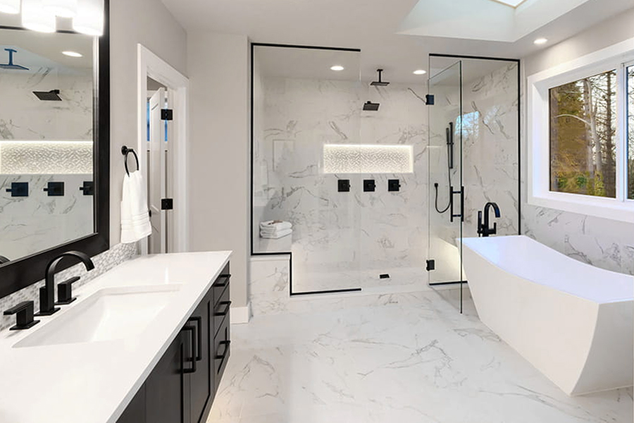 Classic marble bathroom renovation with glass shower enclosure